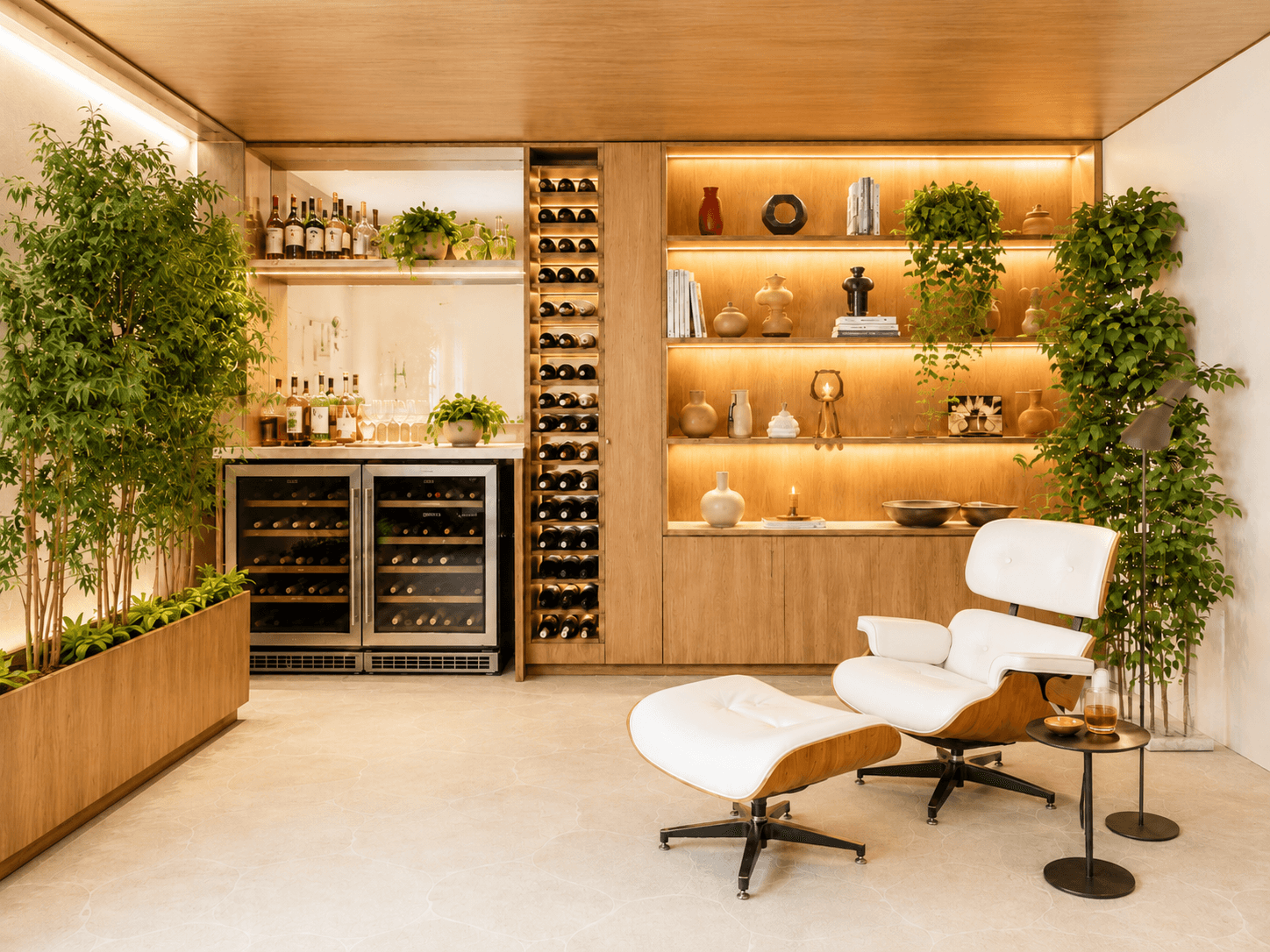 Adega e estante de madeira iluminadas em um apartamento projetado pela Studio Side, com poltrona branca e plantas